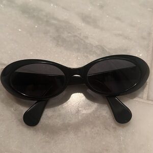 Gucci Black Oval Sunglasses